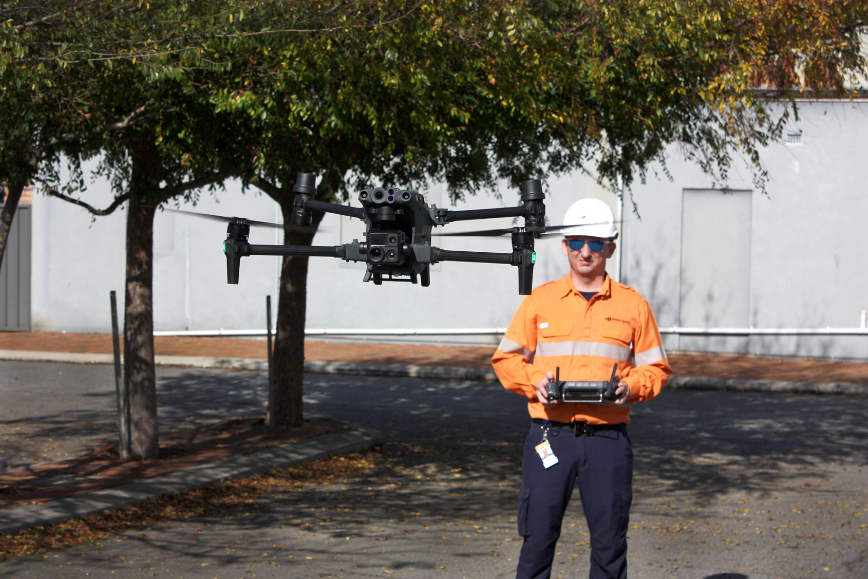 Western Power drone operator flying a drone