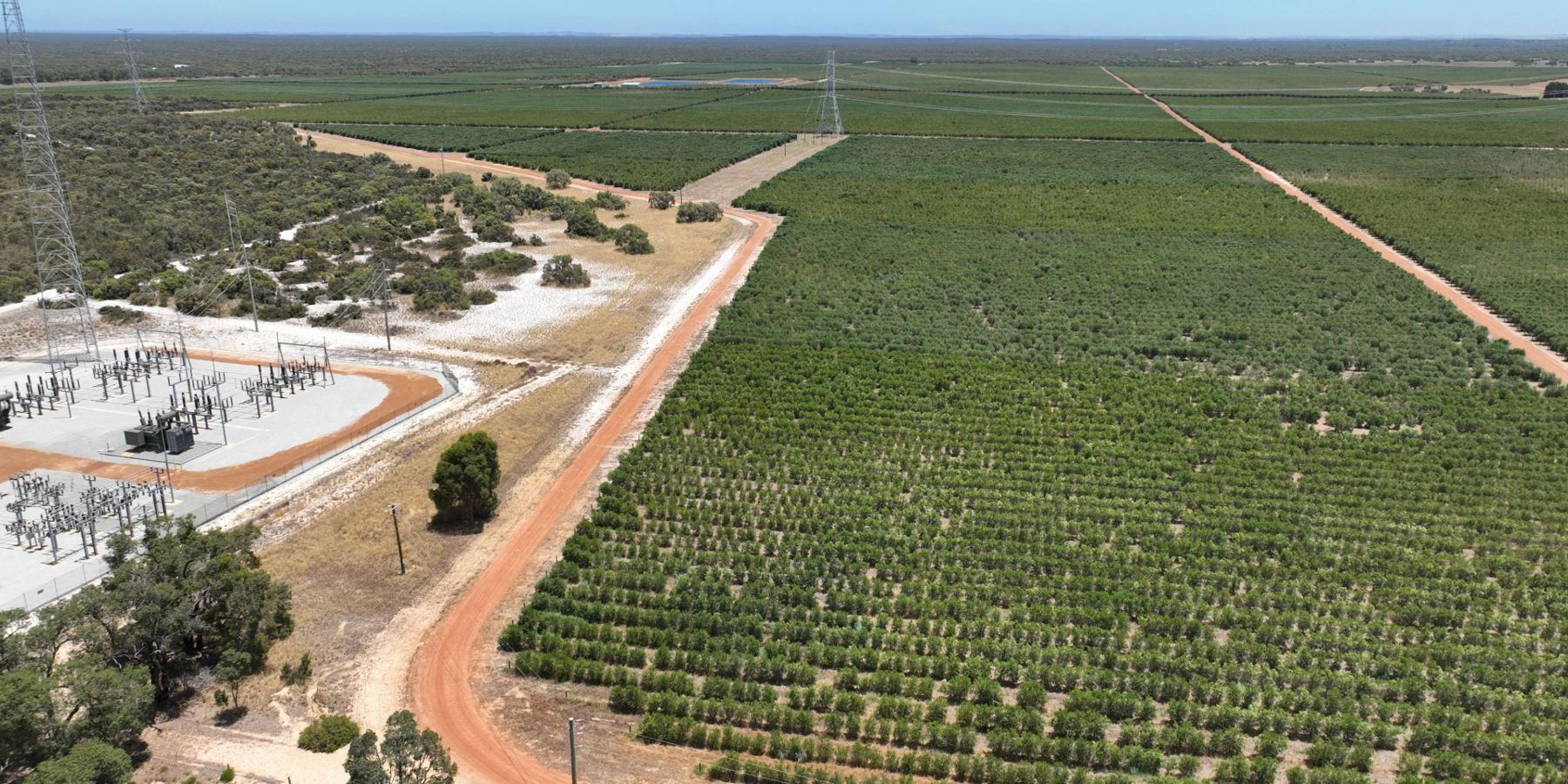 Aerial photo of the Regans substation gravel road and farmland in the background.