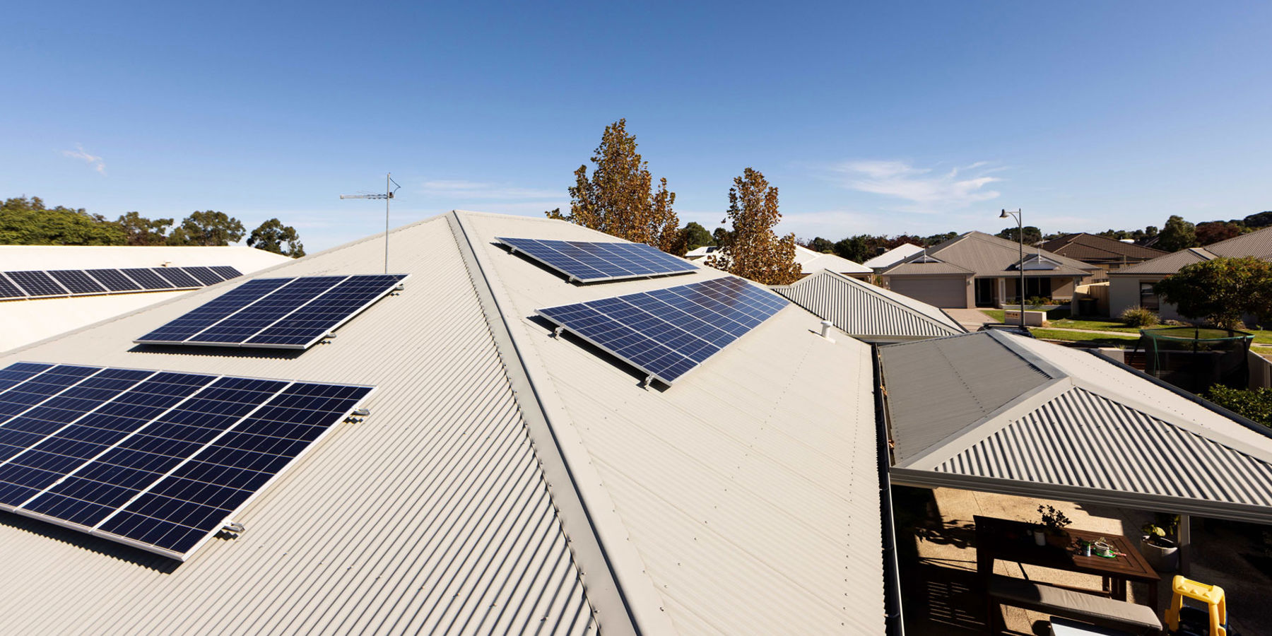 Rooftop solar panels on a suburban house